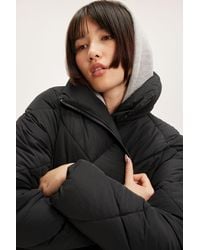 Monki - Black Oversized Quilted High Collar Puffer Coat - Lyst