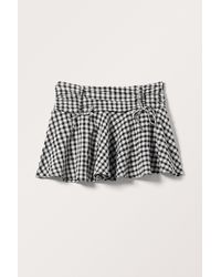 Monki - Short Bow Detail Mini Skirt - Lyst