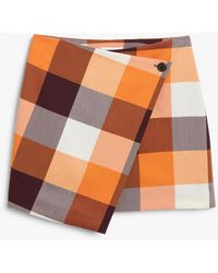 Monki - Buttoned Mini Wrap Skirt - Lyst
