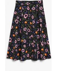 Monki - Buttoned Black Floral A-line Midi Skirt - Lyst