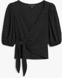 Monki - Black Wrap Top With Puff Sleeves - Lyst