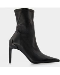 Courreges Boots for Women | Online Sale up to 76% off | Lyst
