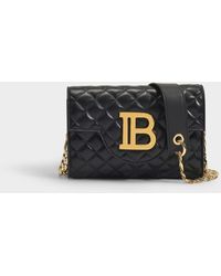 Balmain B-enveloppe Bag In Black Quilted Lambskin With Metallic Logo