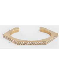 Burberry Bolt Bangle Bracelet In Golden Brass - Metallic