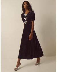 Monsoon - Bella Puff Sleeve Embellished Bow Velvet Dress Black - Lyst