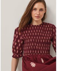 Monsoon - Laurie Floral Smocked Midi Dress Red - Lyst