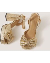 Monsoon - Iona Bow Platform Heels Gold - Lyst