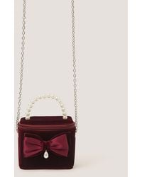 Monsoon - Bow Velvet Bag Red - Lyst
