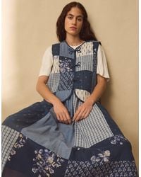 Monsoon - East Milly Quilted Floral Patchwork Waistcoat Blue - Lyst