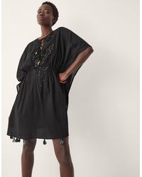 Monsoon - Women's Black & Gold Cotton Embellished Jada Mini Kaftan, Size: M - Lyst