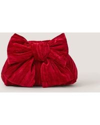 Monsoon - Taya Velvet Bow Clutch Bag - Lyst