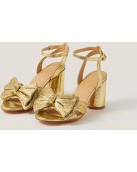 Monsoon - Metallic Bow Block Heel Sandals Gold - Lyst