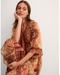 Monsoon - Evelina Shimmer Floral Print Midi Dress Brown - Lyst