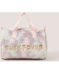 Monsoon - Fluffy Sleepover Duffle Bag - Lyst