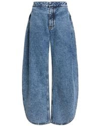 Alaïa - High Waist Side Slit Jeans - Lyst