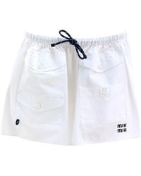 Miu Miu - Multipocket Miniskirt With Embroidered Logo - Lyst
