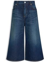 Alaïa - Denim Palazzo Shorts - Lyst