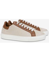 Moschino - Sneakers Aus Canvas Allover Logo - Lyst