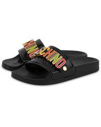 moschino lettering jewel pool slides