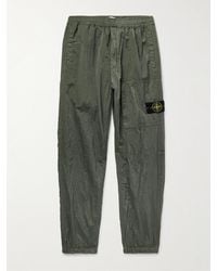 Stone Island - Tapered Logo-appliquéd Nylon Metal Track Pants - Lyst