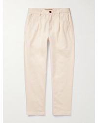 FRIZMWORKS - Haworth Tapered Cropped Pleated Cotton-Twill Trousers - Lyst