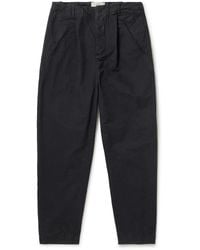 Folk - Assembly Tapered Pleated Cotton-Canvas Trousers - Lyst