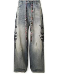 Balenciaga - Y2K Wide-Leg Distressed Printed Jeans - Lyst
