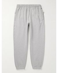 Nike - Solo Swoosh schmal zulaufende Jogginghose aus Jersey aus einer Baumwollmischung mit Logostickerei - Lyst