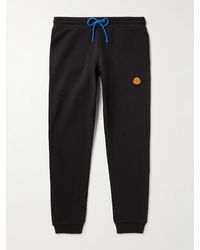 Moncler - Tapered Logo-appliquéd Cotton-jersey Sweatpants - Lyst