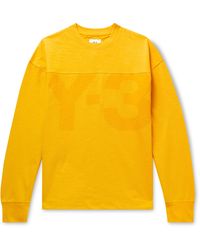 light yellow crew neck sweatshirt