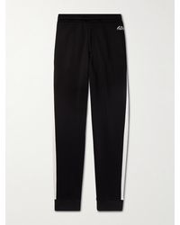 Alexander McQueen - Tapered Logo-embroidered Striped Jersey Sweatpants - Lyst
