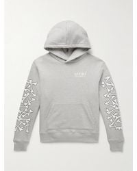 Amiri - Bones Stacked Logo-Appliquéd Printed Cotton-Jersey Hoodie - Lyst