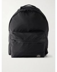 Stone Island - Logo-Appliqué Coated Econyl Nylon Metal Messenger Backpack - Lyst