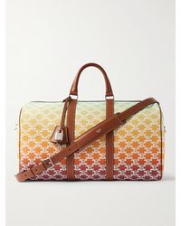 Celine - Medium Voyage Leather-Trimmed Logo-Print Coated-Canvas Holdall - Lyst