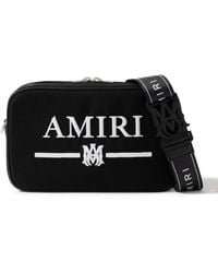 Amiri - Leather-trimmed Logo-embroidered Canvas Messenger Bag - Lyst