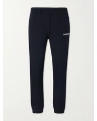 Burberry - Tapered Logo-Print Cotton-Jersey Sweatpants - Lyst