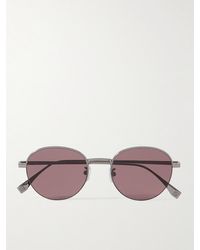 Fendi - Travel silberfarbene Sonnenbrille mit rundem Rahmen - Lyst