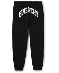 Givenchy - Slim-fit Tapered Logo-print Cotton-jersey Sweatpants - Lyst