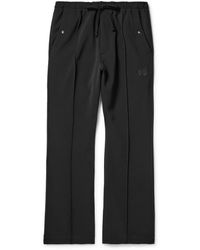 Needles - Cowboy Slim-fit Flared Logo-embroidered Tech-jersey Trousers - Lyst