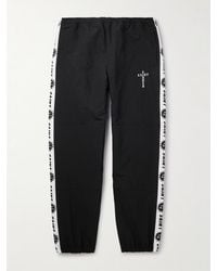 SAINT Mxxxxxx - Tapered Logo-Embroidered Striped Nylon-Twill Track Pants - Lyst