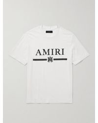 Amiri - T-shirt in jersey di cotone con logo applicato - Lyst