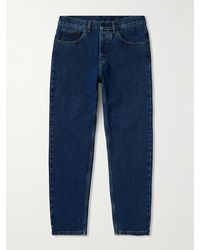 Carhartt - Newel schmal zulaufende Jeans aus Bio-Denim mit Logoapplikation - Lyst