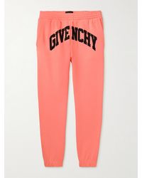Givenchy - Pantaloni sportivi a gamba affusolata in jersey di cotone con logo ricamato - Lyst