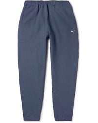 Nike - Solo Swoosh Tapered Logo-embroidered Cotton-blend Jersey Sweatpants - Lyst