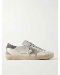 Golden Goose - Super-Star Sneakers aus Leder mit Velourslederbesatz in Distressed-Optik - Lyst