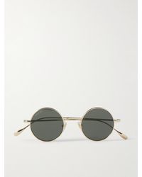 Gucci - Goldfarbene Sonnenbrille mit rundem Rahmen - Lyst