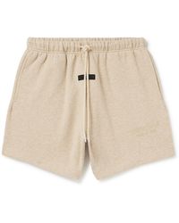 Fear of God ESSENTIALS Logo-appliquéd Wide-leg Cotton-blend Jersey  Drawstring Shorts in Natural for Men