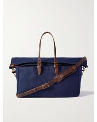 Bleu De Chauffe - Cabine Reisetasche aus Baumwoll-Canvas mit Lederbesatz - Lyst