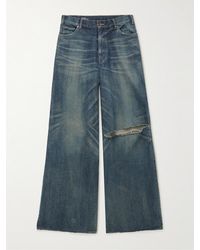 CELINE HOMME Wide-leg Distressed Jeans - Blue