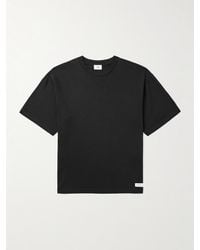Saint Laurent - T-Shirt aus Jersey aus einer Baumwoll-Modalmischung mit Logoapplikation - Lyst
